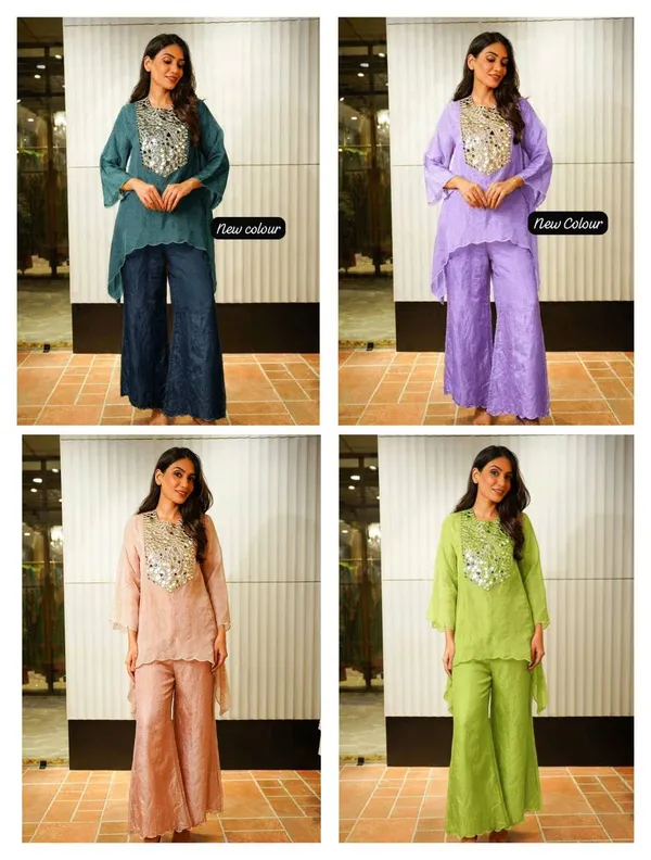 Beautiful_Heavy_quality_Tebby_Silk_Fabric_designer_festive_wear_2pc_Cord_Set_with_Semi-Bell_Sleeves_&_Crape_Lining._Paired_with_Coded_Embroidery_&_original_mirror_work_on_yoke_&_Arkha_Work