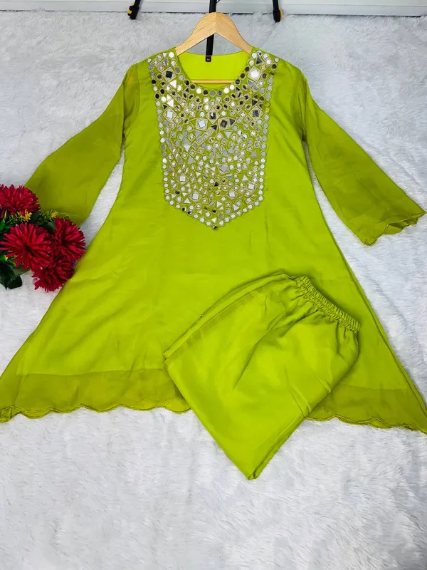 Beautiful_Heavy_quality_Tebby_Silk_Fabric_designer_festive_wear_2pc_Cord_Set_with_Semi-Bell_Sleeves_&_Crape_Lining._Paired_with_Coded_Embroidery_&_original_mirror_work_on_yoke_&_Arkha_Work