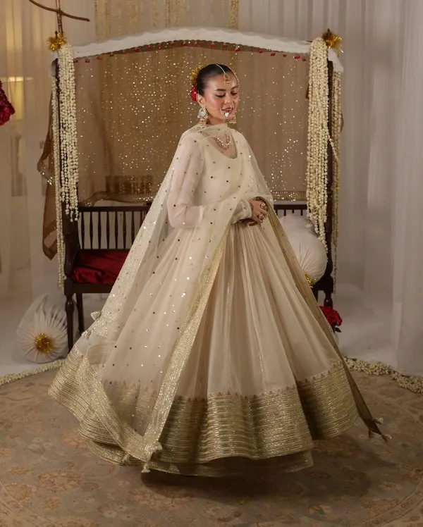 Elegant_Off_White_Anarkali_Salwar_Suit_With_Golden_Embellished_Border