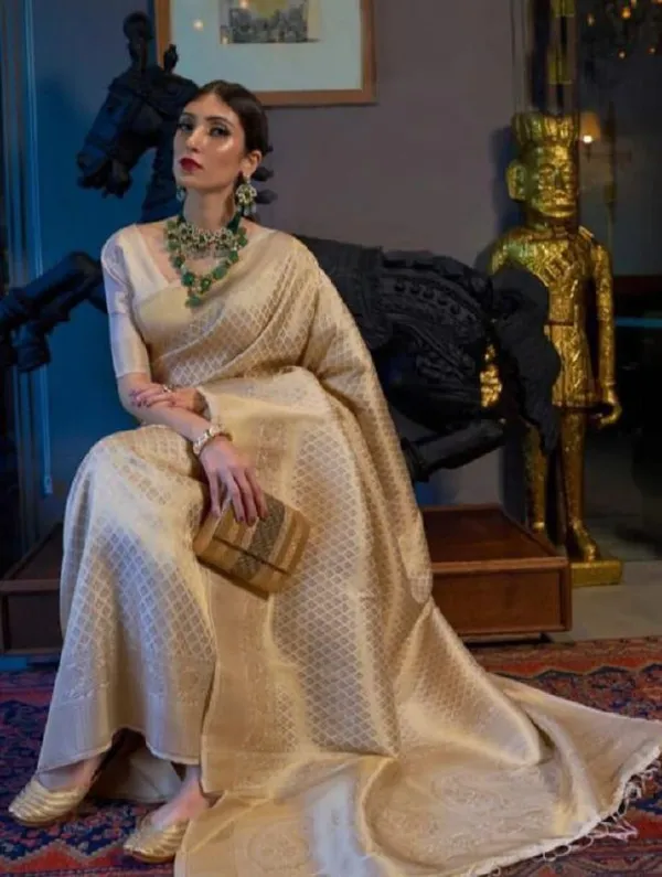 Elegant_Golden_Saree_with_premium_fabric_and_beautiful_design,_perfect_for_weddings,_parties_&_festive_occasions._Stylish_look_with_graceful_drape_for_a_royal_appearance.