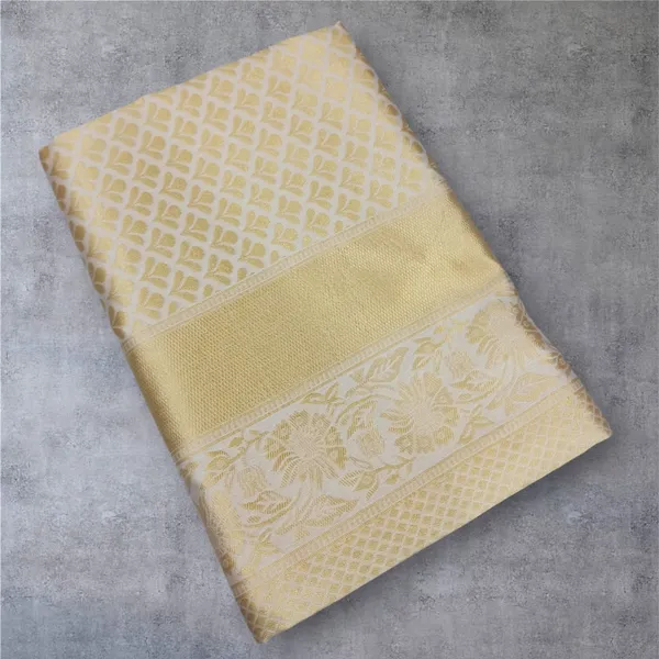 Elegant_Golden_Saree_with_premium_fabric_and_beautiful_design,_perfect_for_weddings,_parties_&_festive_occasions._Stylish_look_with_graceful_drape_for_a_royal_appearance.