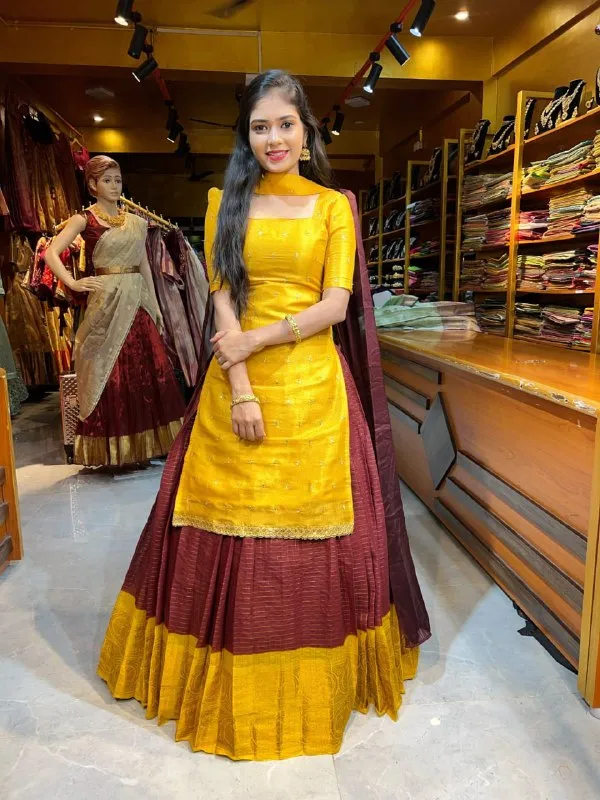 Elegant_brown_lehenga_crafted_with_rich_fabric_and_graceful_detailing,_perfect_for_weddings,_festive_occasions,_and_traditional_celebrations._Its_classy_earthy_tone_adds_a_royal_and_modern_ethnic_charm_to_your_look.