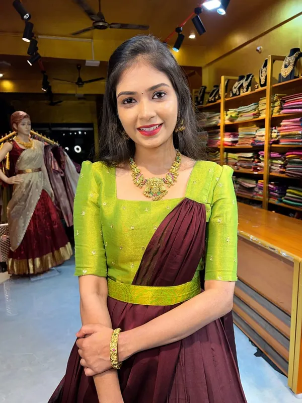 Elegant_brown_lehenga_crafted_with_rich_fabric_and_graceful_detailing,_perfect_for_weddings,_festive_occasions,_and_traditional_celebrations._Its_classy_earthy_tone_adds_a_royal_and_modern_ethnic_charm_to_your_look.