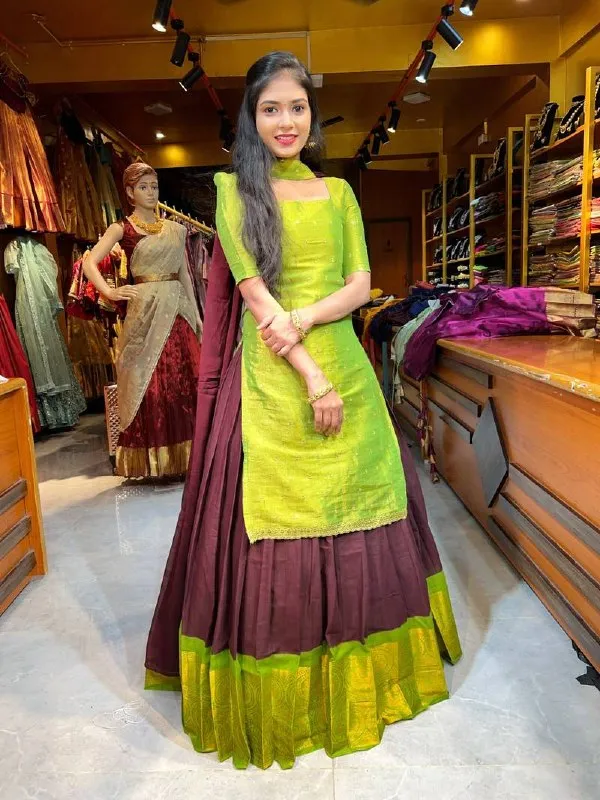 Elegant_brown_lehenga_crafted_with_rich_fabric_and_graceful_detailing,_perfect_for_weddings,_festive_occasions,_and_traditional_celebrations._Its_classy_earthy_tone_adds_a_royal_and_modern_ethnic_charm_to_your_look.
