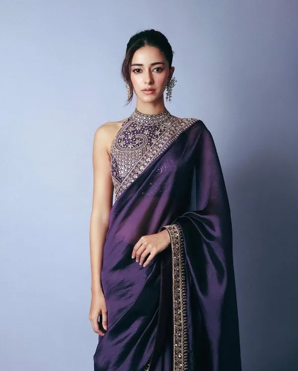 Elegant_purple_saree_with_graceful_design_and_rich_fabric,_perfect_for_weddings,_parties,_festive_wear,_and_special_occasions._Its_stylish_look_and_comfortable_drape_add_charm_and_sophistication_to_your_ethnic_wardrobe._✨💜