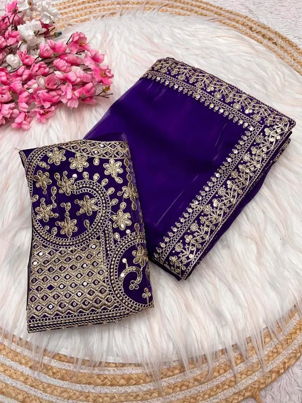 Elegant_purple_saree_with_graceful_design_and_rich_fabric,_perfect_for_weddings,_parties,_festive_wear,_and_special_occasions._Its_stylish_look_and_comfortable_drape_add_charm_and_sophistication_to_your_ethnic_wardrobe._✨💜