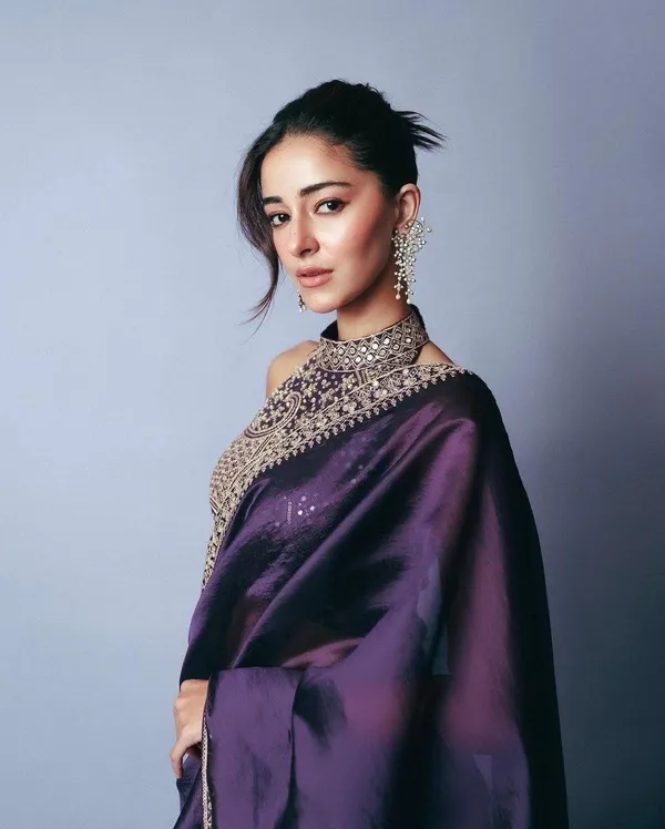 Elegant_purple_saree_with_graceful_design_and_rich_fabric,_perfect_for_weddings,_parties,_festive_wear,_and_special_occasions._Its_stylish_look_and_comfortable_drape_add_charm_and_sophistication_to_your_ethnic_wardrobe._✨💜