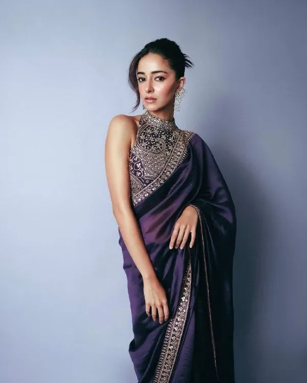 Elegant_purple_saree_with_graceful_design_and_rich_fabric,_perfect_for_weddings,_parties,_festive_wear,_and_special_occasions._Its_stylish_look_and_comfortable_drape_add_charm_and_sophistication_to_your_ethnic_wardrobe._✨💜