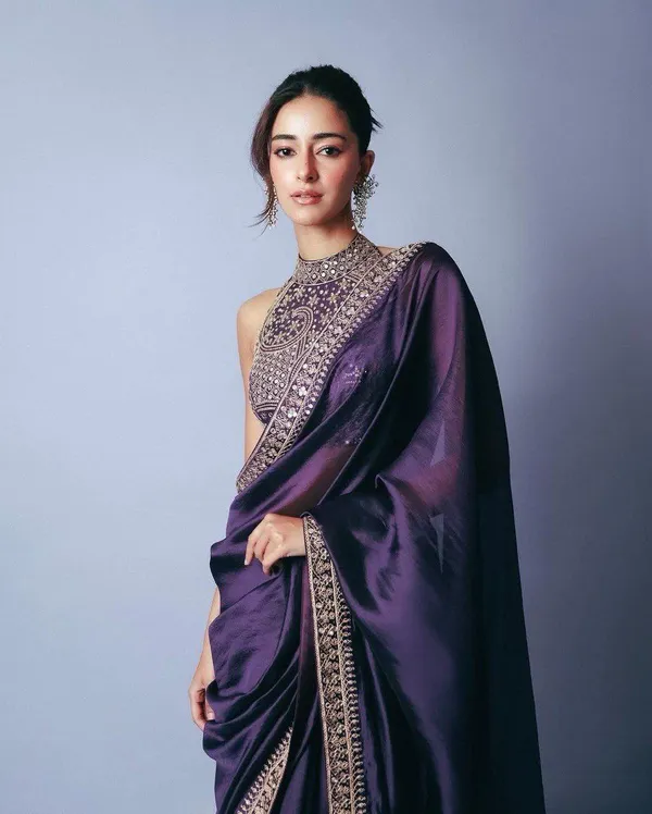 Elegant_purple_saree_with_graceful_design_and_rich_fabric,_perfect_for_weddings,_parties,_festive_wear,_and_special_occasions._Its_stylish_look_and_comfortable_drape_add_charm_and_sophistication_to_your_ethnic_wardrobe._✨💜