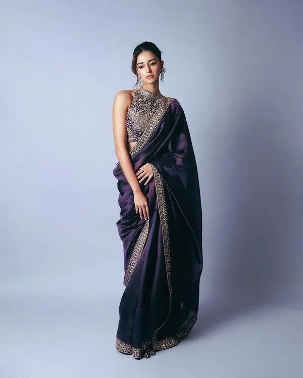 Elegant_purple_saree_with_graceful_design_and_rich_fabric,_perfect_for_weddings,_parties,_festive_wear,_and_special_occasions._Its_stylish_look_and_comfortable_drape_add_charm_and_sophistication_to_your_ethnic_wardrobe._✨💜