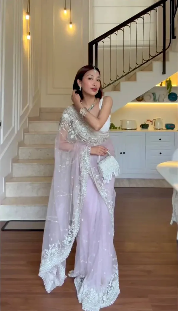 Lavender_Embroidered_Saree_With_Silver_Embellishments_And_White_Tassel_Clutch