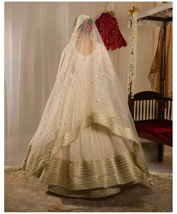 Elegant_Off_White_Anarkali_Salwar_Suit_With_Golden_Embellished_Border