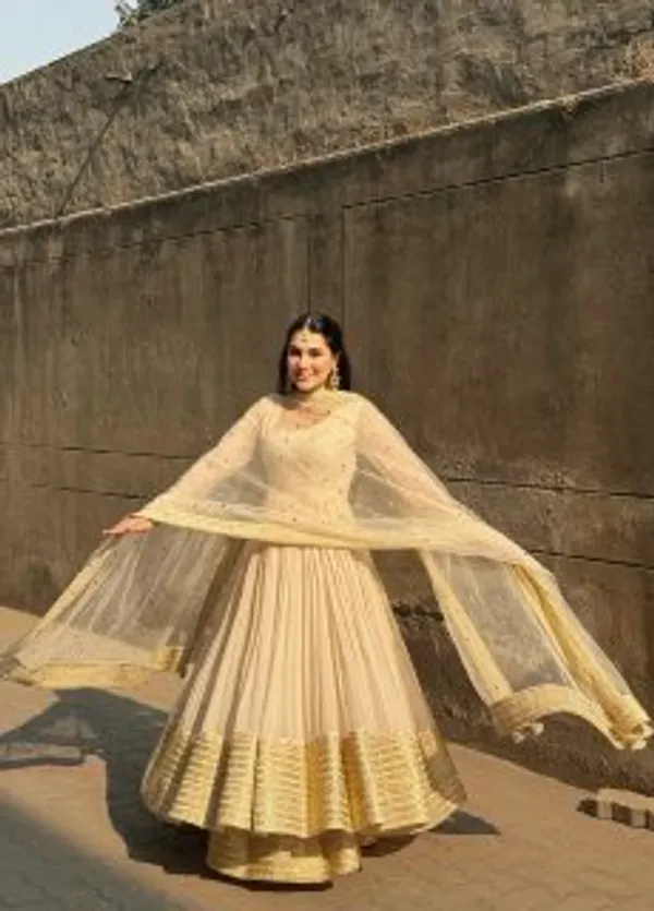 Elegant_Off_White_Anarkali_Salwar_Suit_With_Golden_Embellished_Border