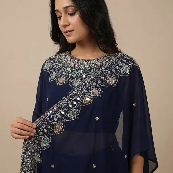 Exclusive_2_Styles_Hand_Worked_Drape_Saree_On_Faux_Georgette_Fabric_With_Stitched_Blouse