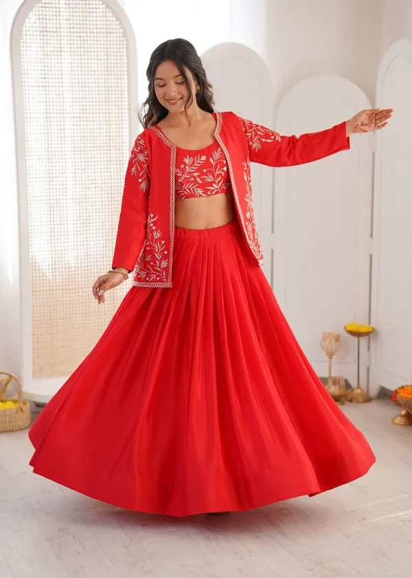 orange_lehenga_designed_with_elegant_detailing_and_graceful_flair._Perfect_for_weddings,_festive_occasions,_sangeet,_and_ethnic_celebrations