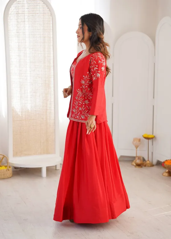 orange_lehenga_designed_with_elegant_detailing_and_graceful_flair._Perfect_for_weddings,_festive_occasions,_sangeet,_and_ethnic_celebrations