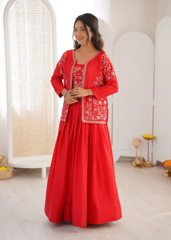 orange_lehenga_designed_with_elegant_detailing_and_graceful_flair._Perfect_for_weddings,_festive_occasions,_sangeet,_and_ethnic_celebrations