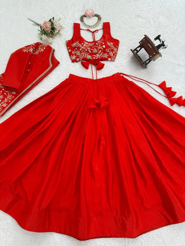 orange_lehenga_designed_with_elegant_detailing_and_graceful_flair._Perfect_for_weddings,_festive_occasions,_sangeet,_and_ethnic_celebrations