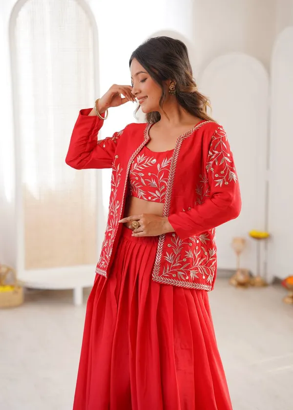 orange_lehenga_designed_with_elegant_detailing_and_graceful_flair._Perfect_for_weddings,_festive_occasions,_sangeet,_and_ethnic_celebrations