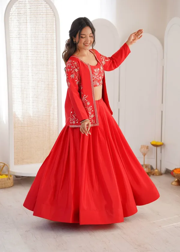 orange_lehenga_designed_with_elegant_detailing_and_graceful_flair._Perfect_for_weddings,_festive_occasions,_sangeet,_and_ethnic_celebrations