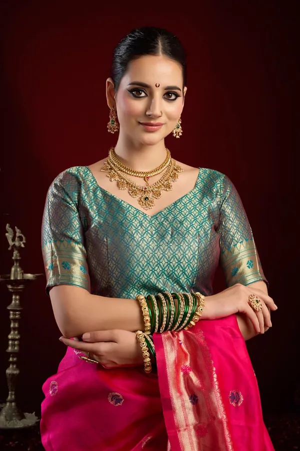 Pink_Paithani_Silk_Saree_With_Zari_Pallu_&_Contrast_Blue_Blouse_For_Women