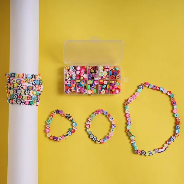 Multicolor_10-Partition_Rubber_Beads_Bracelet_Making_Kit_for_Kids_|_10_Designs_of_Emoji,_Heart,_Flower,_Butterfly_Beads_|_Includes_Elastic_Thread_&_Mini_Scissors_|_DIY_Jewellery_Craft_Set_for_Girls_&_Boys