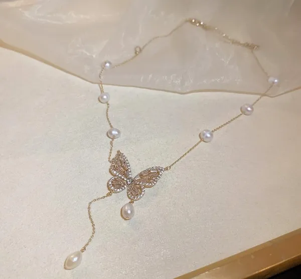 Rust_Platinum_Butterfly_Pearl_Tassel_Pendant_Platinum_Jewellery_Set