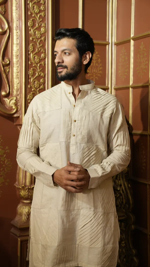 BEIGE_LINEN_SOLID_PLEATED_REGULAR_FIT_DESIGNER_KURTA_SET