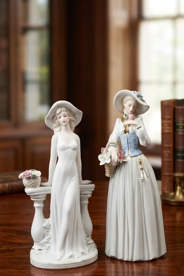 Elegant_White_Porcelain_Angel_Figurines_Set_Of_2
