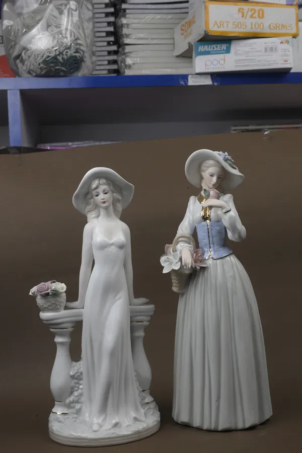 Elegant_White_Porcelain_Angel_Figurines_Set_Of_2