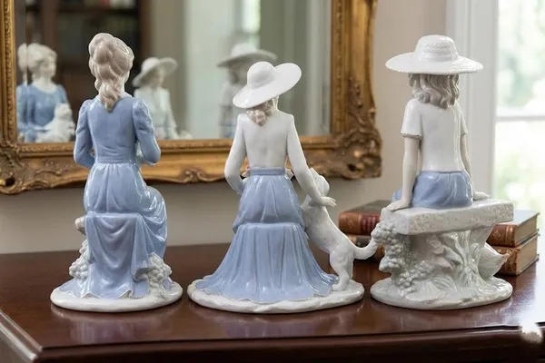 Elegant_Porcelain_Lady_Figurines_With_Hats_And_Geese_Set_Of_3