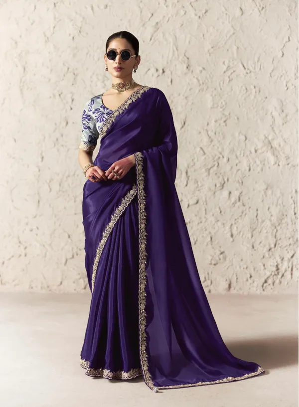 AN_EMBODIMENT_OF_UNDERSTATED_LUXURY,_THIS_SAREE_FEATURES_A_FLUID_DRAPE_AND_SOFT,_LUMINOUS_FINISH_,_ITS_ELEGANT_TEXTURE_AND_REFINED_CRFTSMANSHIP_CREATE_A_SILHOUETTE_THAT_IS_EFFORTLESSLY_GRACEFUL_PREFECT_FOR_BOTH_GRAND_OCCASIONS_AND_INTIMATE_CELEBRATION
