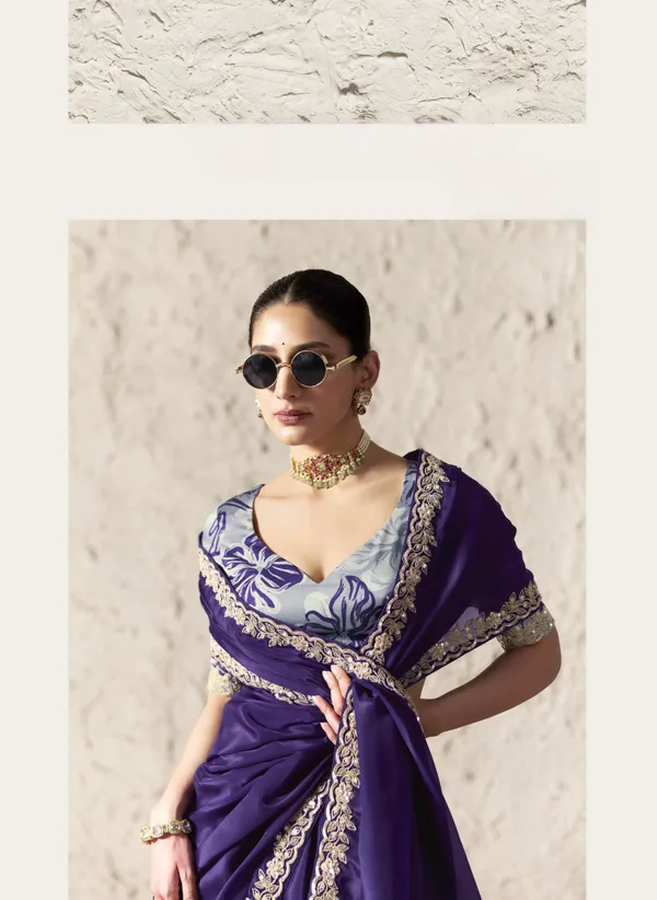 AN_EMBODIMENT_OF_UNDERSTATED_LUXURY,_THIS_SAREE_FEATURES_A_FLUID_DRAPE_AND_SOFT,_LUMINOUS_FINISH_,_ITS_ELEGANT_TEXTURE_AND_REFINED_CRFTSMANSHIP_CREATE_A_SILHOUETTE_THAT_IS_EFFORTLESSLY_GRACEFUL_PREFECT_FOR_BOTH_GRAND_OCCASIONS_AND_INTIMATE_CELEBRATION