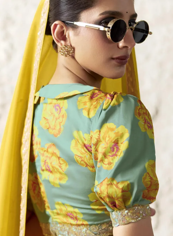 AN_EMBODIMENT_OF_UNDERSTATED_LUXURY,_THIS_SAREE_FEATURES_A_FLUID_DRAPE_AND_SOFT,_LUMINOUS_FINISH_,_ITS_ELEGANT_TEXTURE_AND_REFINED_CRFTSMANSHIP_CREATE_A_SILHOUETTE_THAT_IS_EFFORTLESSLY_GRACEFUL_PREFECT_FOR_BOTH_GRAND_OCCASIONS_AND_INTIMATE_CELEBRATION