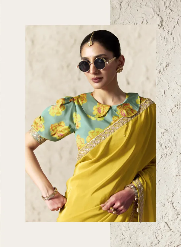 AN_EMBODIMENT_OF_UNDERSTATED_LUXURY,_THIS_SAREE_FEATURES_A_FLUID_DRAPE_AND_SOFT,_LUMINOUS_FINISH_,_ITS_ELEGANT_TEXTURE_AND_REFINED_CRFTSMANSHIP_CREATE_A_SILHOUETTE_THAT_IS_EFFORTLESSLY_GRACEFUL_PREFECT_FOR_BOTH_GRAND_OCCASIONS_AND_INTIMATE_CELEBRATION