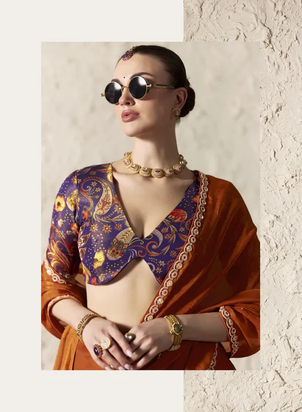 AN_EMBODIMENT_OF_UNDERSTATED_LUXURY,_THIS_SAREE_FEATURES_A_FLUID_DRAPE_AND_SOFT,_LUMINOUS_FINISH_,_ITS_ELEGANT_TEXTURE_AND_REFINED_CRFTSMANSHIP_CREATE_A_SILHOUETTE_THAT_IS_EFFORTLESSLY_GRACEFUL_PREFECT_FOR_BOTH_GRAND_OCCASIONS_AND_INTIMATE_CELEBRATION