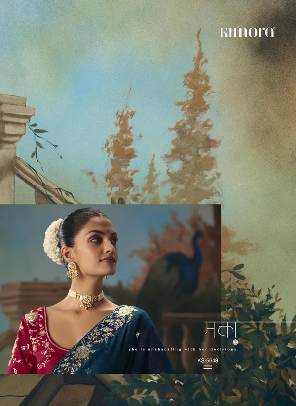 A_designer_work_saree_is_a_perfect_blend_of_tradition_and_contemporary_elegance._Crafted_with_intricate_embroidery,_shimmering_sequins,_delicate_zari,_and_fine_beadwork,_these_sarees_showcase_the_artistry_and_craftsmanship_of_skilled_designers.