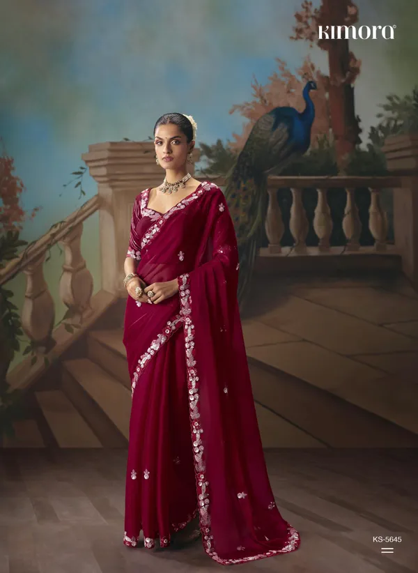 A_designer_work_saree_is_a_perfect_blend_of_tradition_and_contemporary_elegance._Crafted_with_intricate_embroidery,_shimmering_sequins,_delicate_zari,_and_fine_beadwork,_these_sarees_showcase_the_artistry_and_craftsmanship_of_skilled_designers.