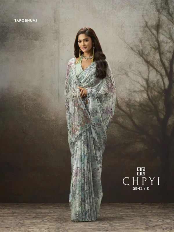 BEAUTIFULL_FENDY_SILK_SAREE_WITH_AMERICAN_DIAMOND_&_SAROSKI_WORK
