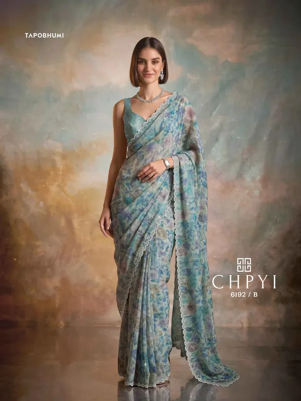 KORA_NET_(SOFT_FABRIC)_SAREE_WITH_HEAVY_SAROSKI_&_AMERICAN_DIAMOND_WORK.
