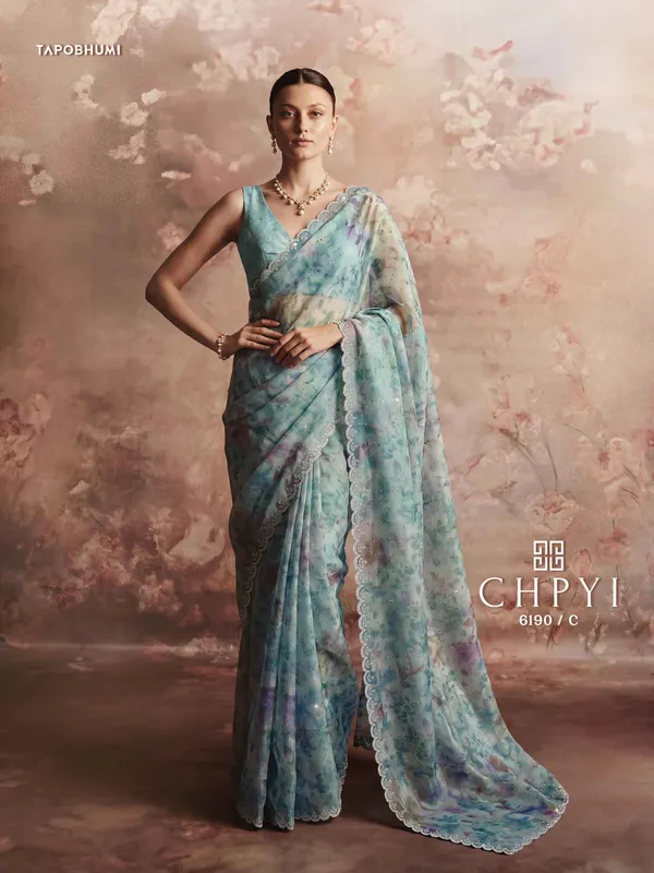 KORA_NET_(SOFT_FABRIC)_SAREE_WITH_HEAVY_SAROSKI_&_AMERICAN_DIAMOND_WORK.
