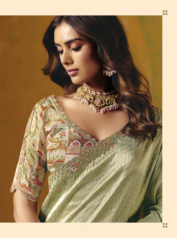 MINT_GREEN_ZARI_VISCOSE_TISSUE_SAREE_WITH_MULTICOLOR_FLORAL_EMBROIDERED_SILK_STICHED_BLOUSE
