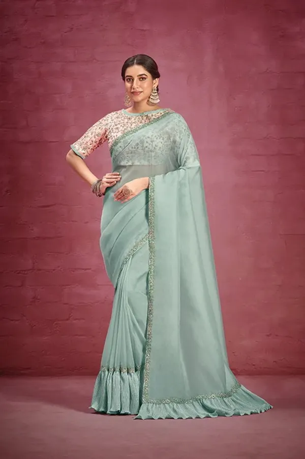 STITCHED_BLOUSE_|_Green_Net_Organza_Flared_Lace_Pallu_Saree