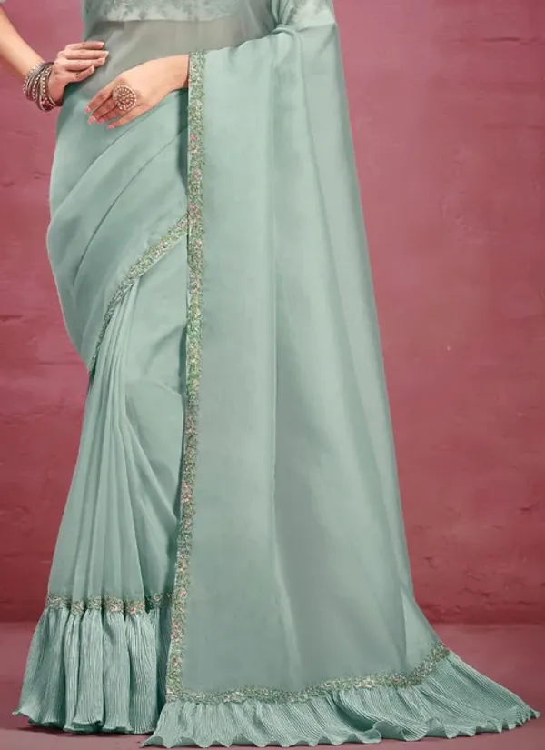 STITCHED_BLOUSE_|_Green_Net_Organza_Flared_Lace_Pallu_Saree