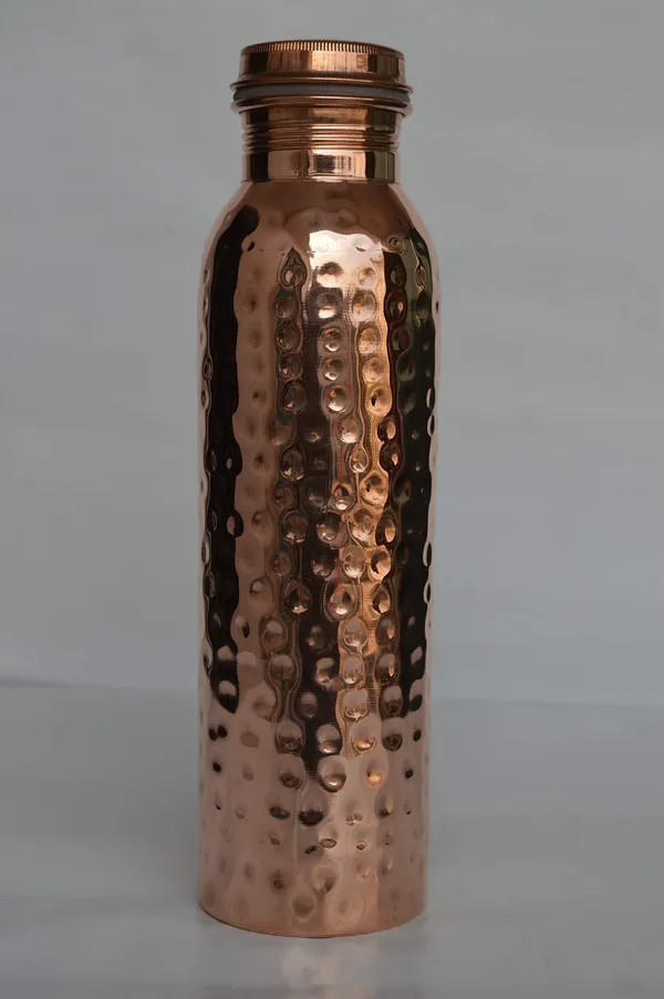 Copper_|_Hammered_Cut_Sets_of_1_Copper_Water_Bottle_Hammer_Bottle_1_Litre_Each_|_Travelling_Purpose,_Yoga_Ayurveda_Healing_|_Copper_Bottle_Water_is_Anti-Aging._It_Helps_Reduce_Fine_Lines.