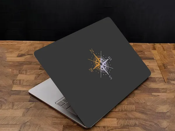 Black_Laminated_Laptop_Skin_For_All_15.6_Waterproof_&_Scratch_Resistant_Trendy_Design_Easy_To_Apply_&_Remove_Protects_From_Dust_And_Spills