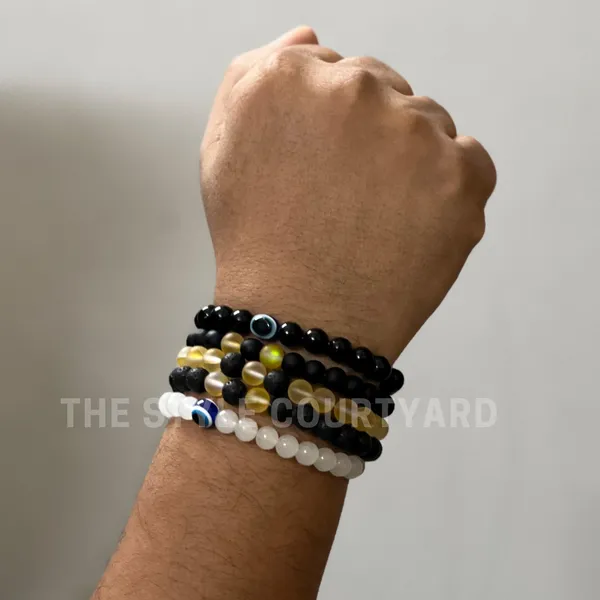 Multicolor_Amplify_&_Rejuvenation_Your_Energy_Harmonious_With_Set_Of_5_Bead_Bracelets_Featuring_Yellow_Aura,_Lava,_Black_Onyx,_White_Evil_Eye,_And_Black_Evil_Eye_Bracelets