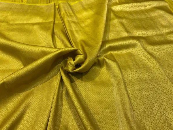 Yellow_Banarasi_Brocade_Premium_&_Elegant_Zari_Weaving_Saree_With_Unstitched_Blouse_For_Women