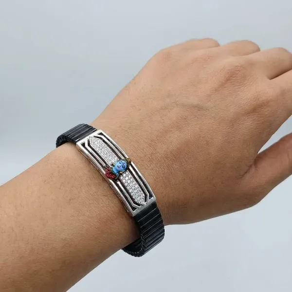 Black_And_Silver_Elegant_Rubber_Strap_Bracelet_With_Crystal_Skull_Embellishment_And_Silver_Detailing