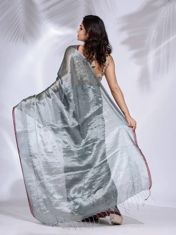 Grey_Handloom_Glossy_Tissue_Saree_With_Rich_Red_Border_Soft,_Lightweight_&_Lustrous_Finish_Perfect_For_Weddings,_Traditional_Elegance_Artisanal_Weaving_Masterpiece_For_Women